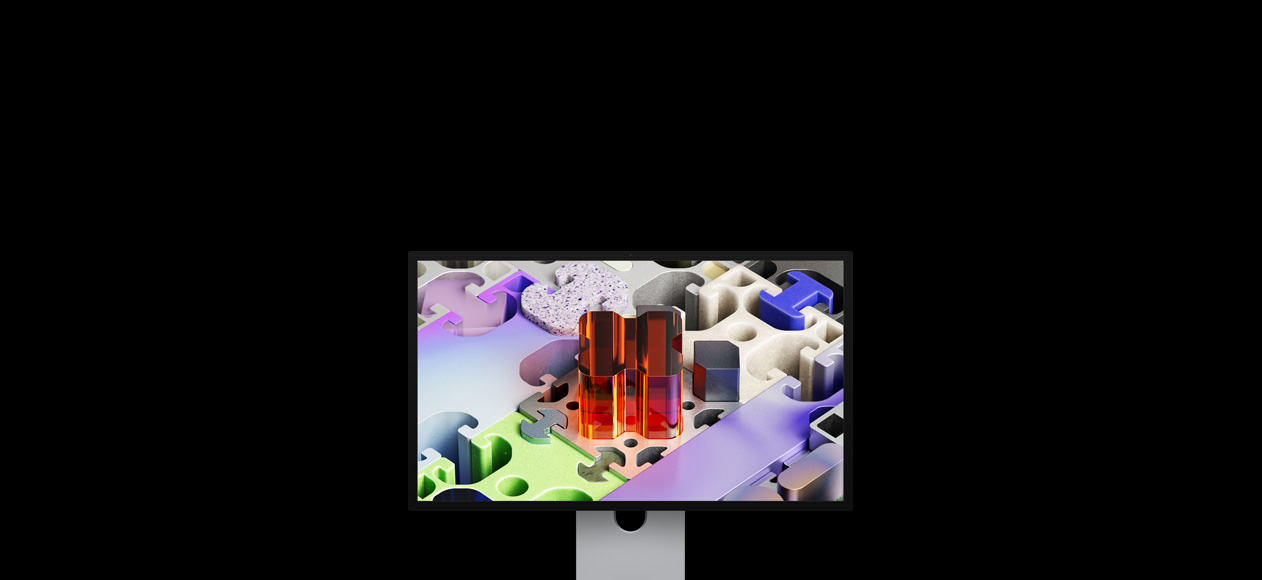 Vorderseite des Studio Display XDR mit einem dreidimensionalen, puzzleähnlichen Hintergrundbild