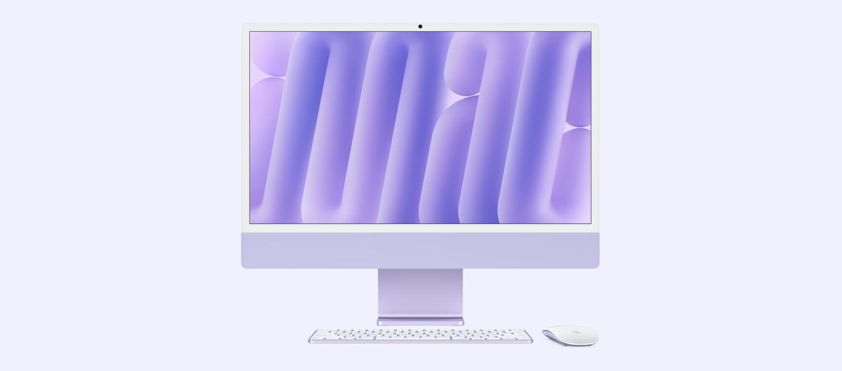 Front view of a purple iMac with colour-matching mouse and keyboard