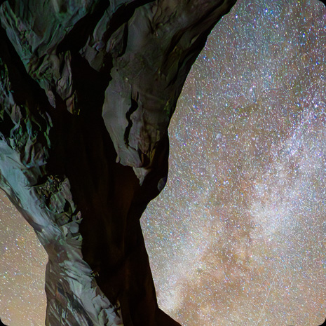 iPad Pro display showing a photograph of a rock structure in front of a star-filled night sky