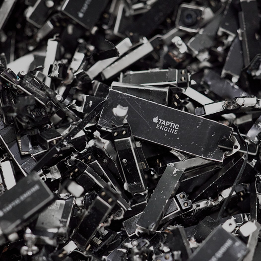 A pile of disassembled device materials